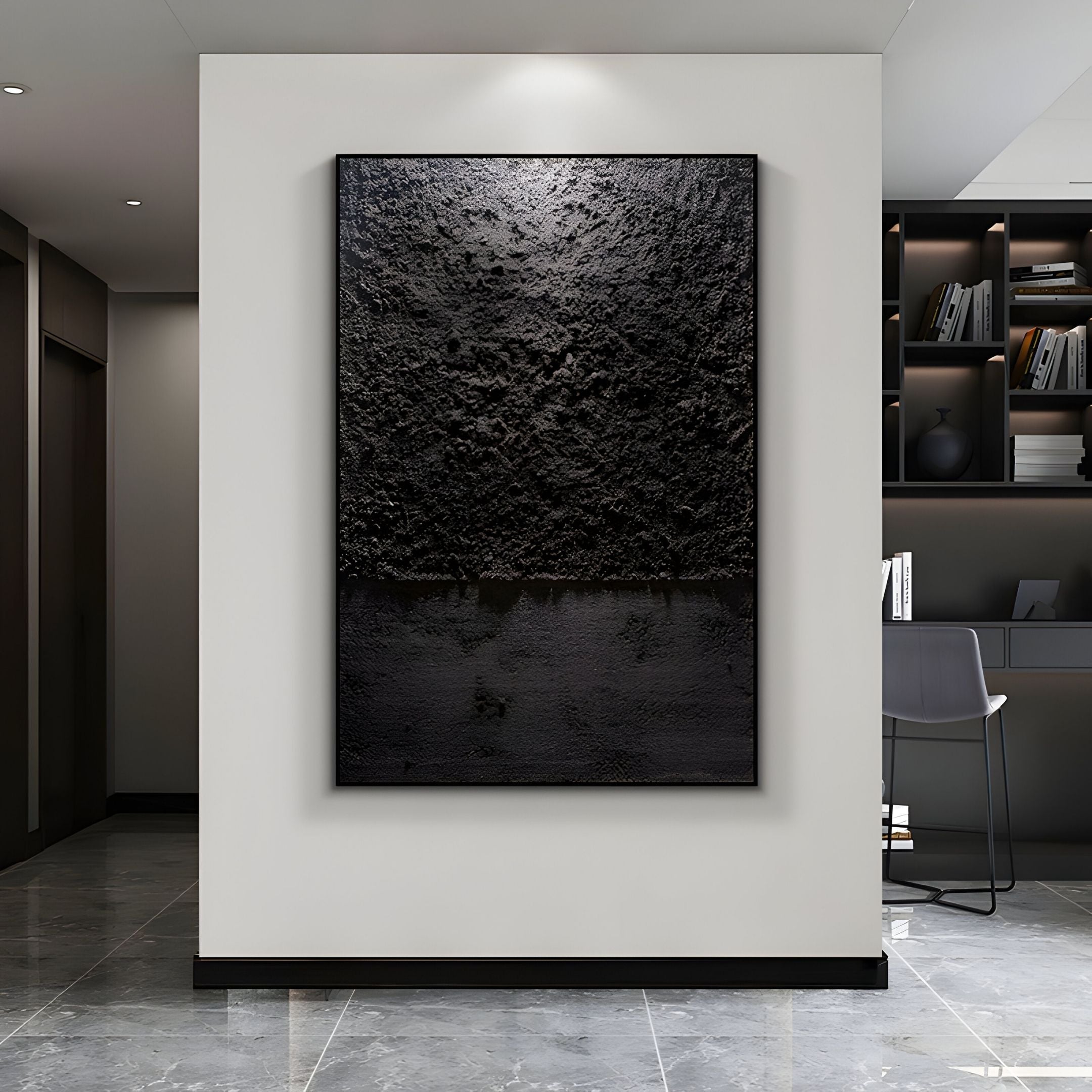 The Aeralune Midnight Black Textured Oil Painting 3D Wall Art by Giant Sculptures adds depth and drama to a modern room, its striking textured surface perfectly complementing marble floors and built-in shelves under focused lighting.