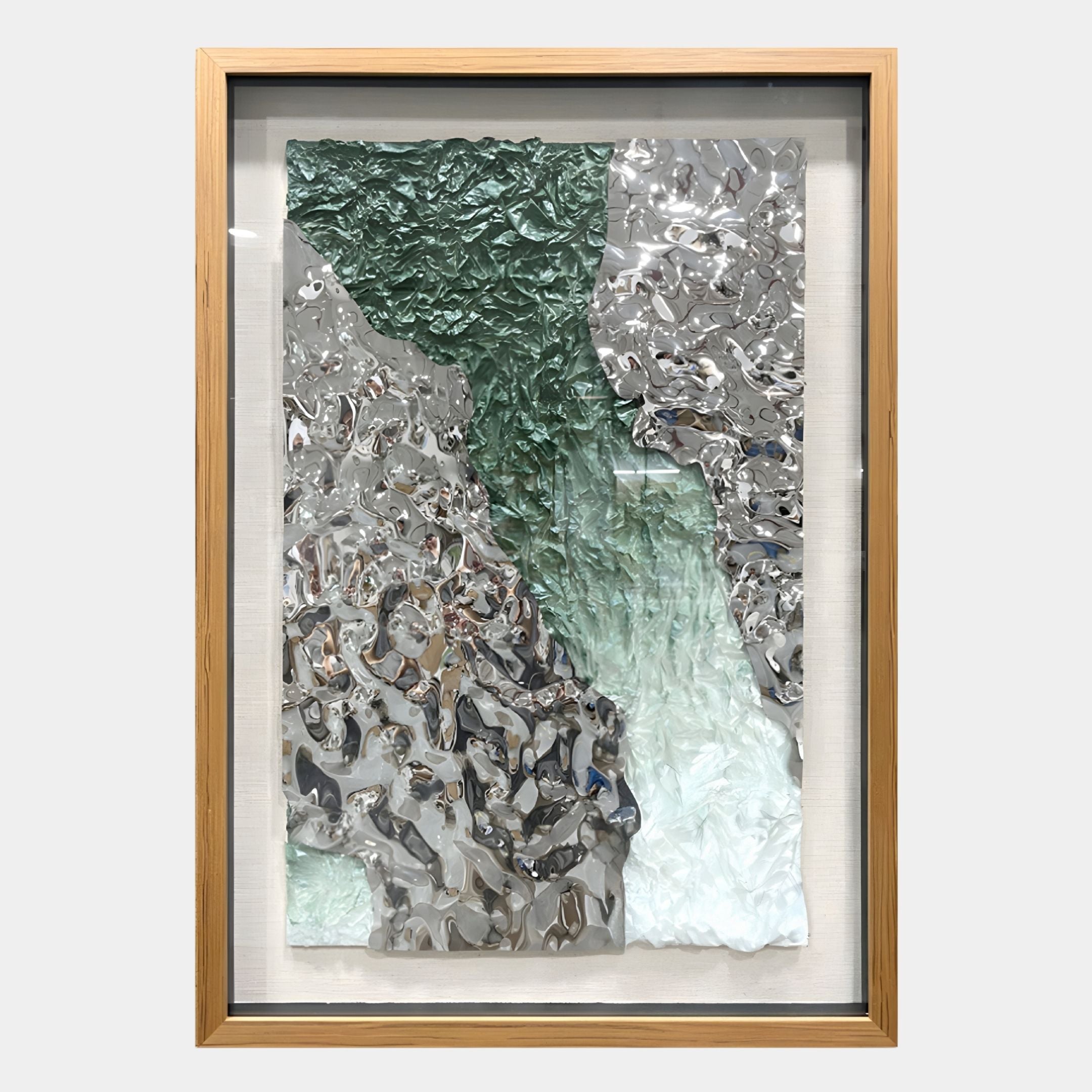 Aurivell II Silver & Green Textured Metal 3D Wall Art by Giant Sculptures features glassy, rippled surfaces in silver, green, and white—ideal for adding a modern touch to your living room decor.