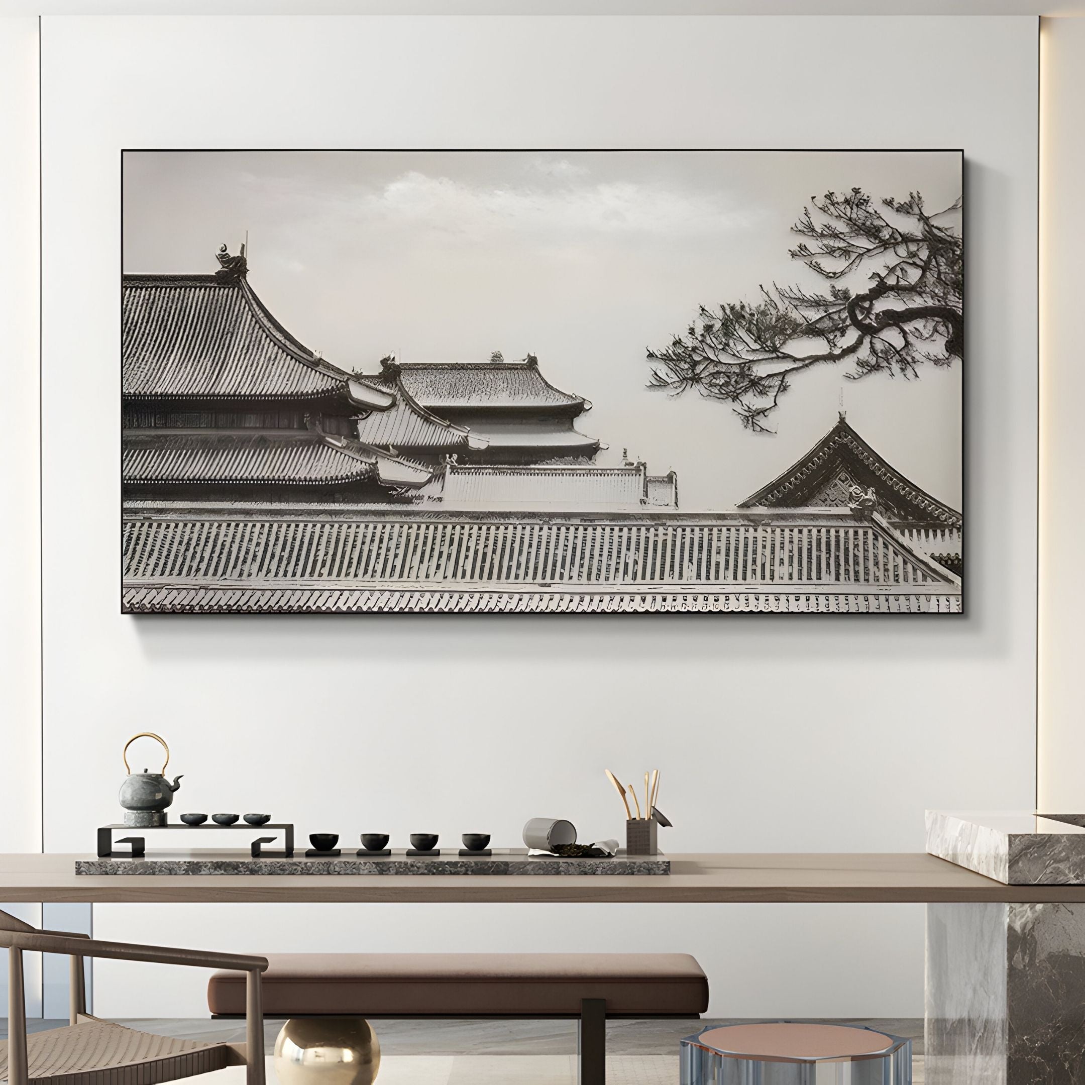 A modern tea room features a long wooden table, stools, and minimalist decor. On the white wall hangs Giant Sculptures' Archion Temple Roofline Nail Painting 3D Wall Art, adding East Asian-inspired elegance to the serene space.