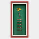 The Cavendor Cigar & Torch Green Framed Wall Art by Giant Sculptures features a cigar cutter, revolver-shaped lighter, and five cigars on a green background—ideal collector decor for your home.