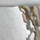 Aerial view of a polar landscape with snowy white and brown textures, echoing the curving edges and patterns of Giant Sculptures' Rivura White Layered Sandstone Texture 3D Wall Art.