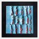 The Rivura Blue Layered Sandstone Texture 3D Wall Art by Giant Sculptures features modern abstract blue panels with jagged, torn edges revealing bright red beneath, set in a black frame and arranged in a grid pattern.