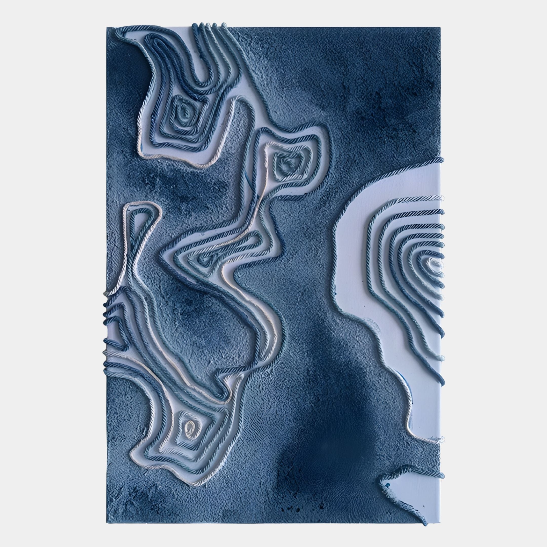 The Terracore Midnight Blue Contour Relief Abstract 3D Wall Art by Giant Sculptures features wavy blue and white contours with smooth textures, evoking elevation and fluidity—an eye-catching piece for modern interiors.