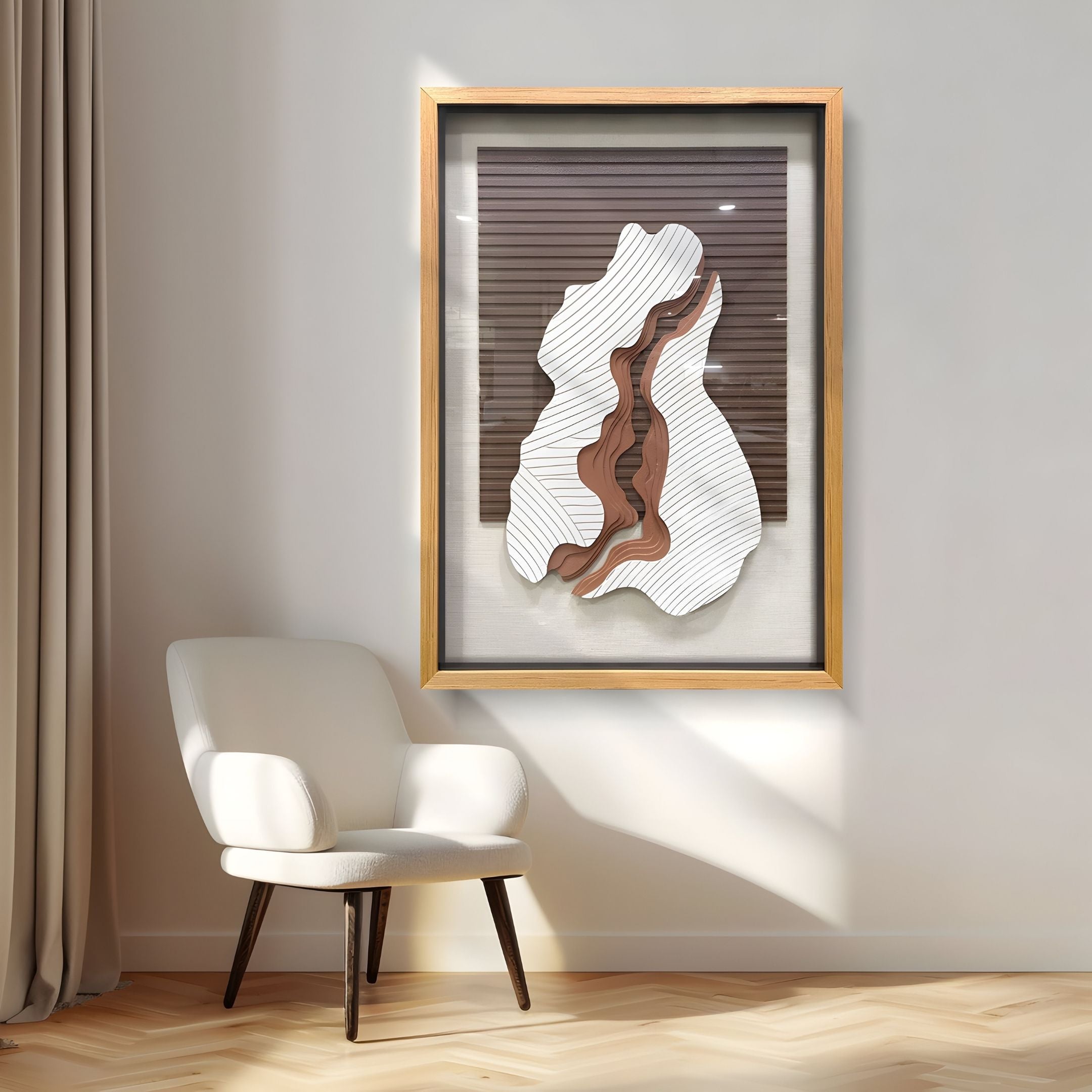 A modern, minimal room with a white armchair and beige curtains features the Terralune Clay & White Layered Wood Carving 3D Wall Art by Giant Sculptures, its layered design highlighted by sunlight streaming onto the floor.