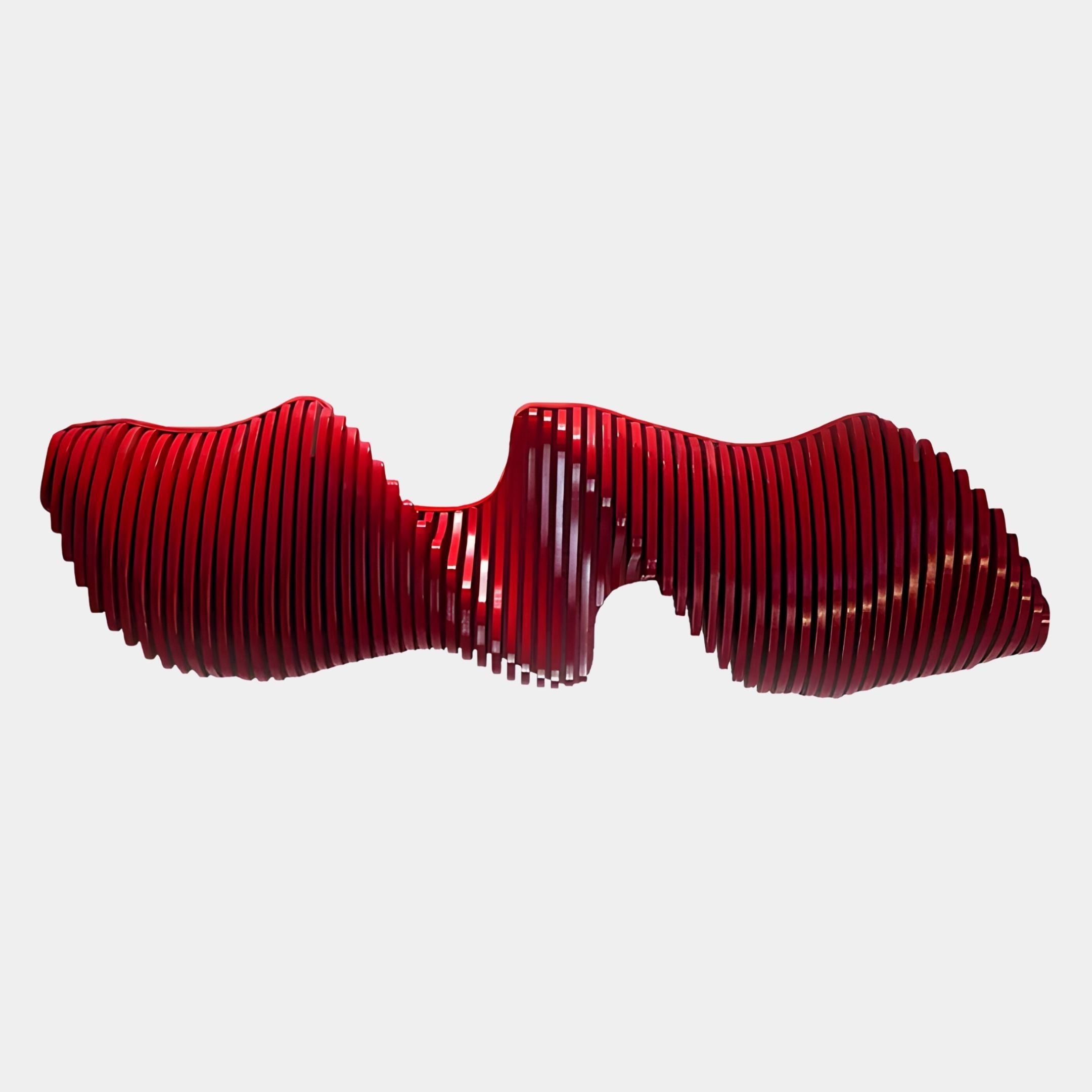 The Aeravox Red Waveform Sculptural 3D Wall Art by Giant Sculptures features curved, parallel slats in a modern red wave design, serving both as a bench and striking wall art to elevate any space against a white background.