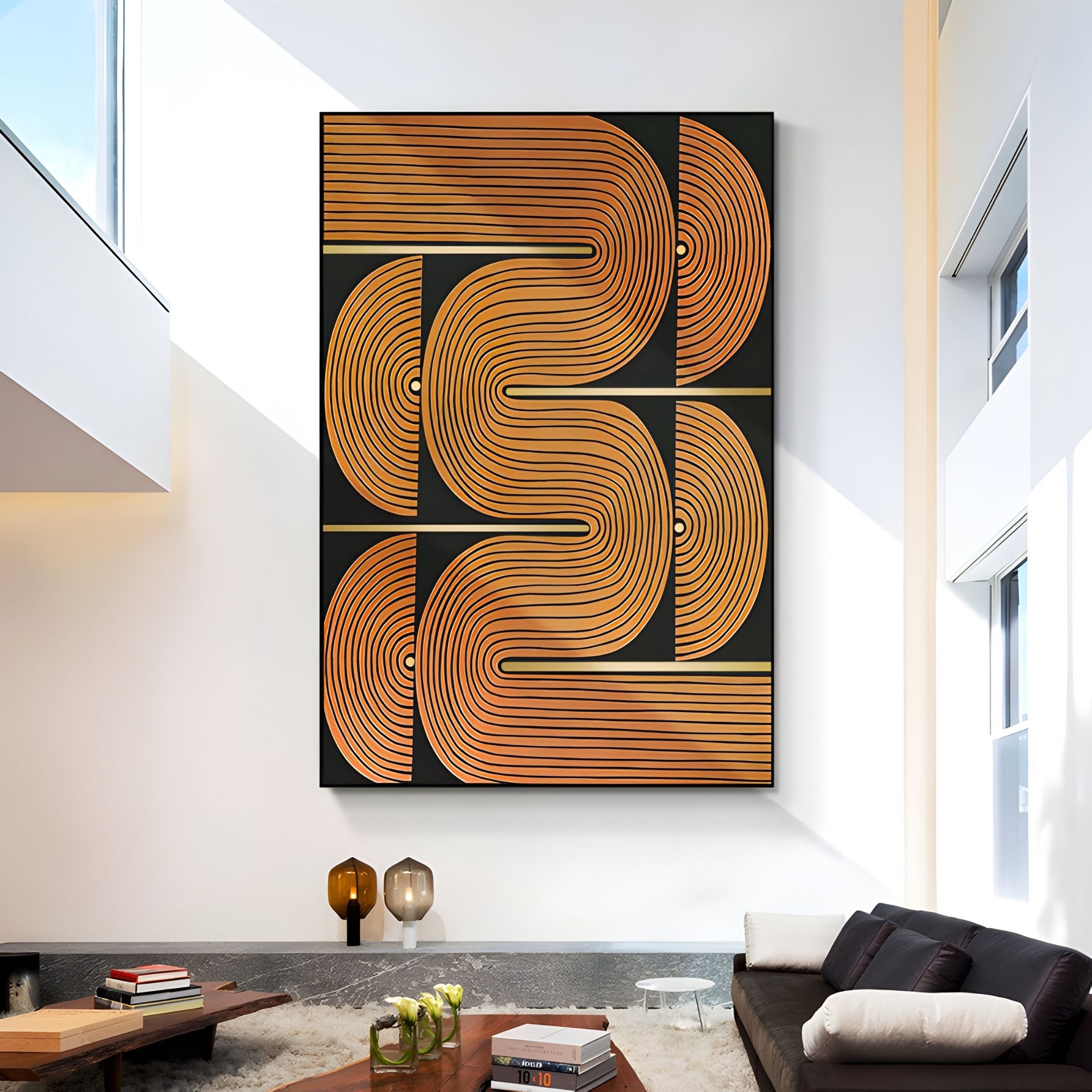 A modern living room features the Curvanta Brown Loop Geometric 3D Wall Art by Giant Sculptures, with gold and copper curves on black above a dark sofa, while a coffee table with decor completes this stylish setting.