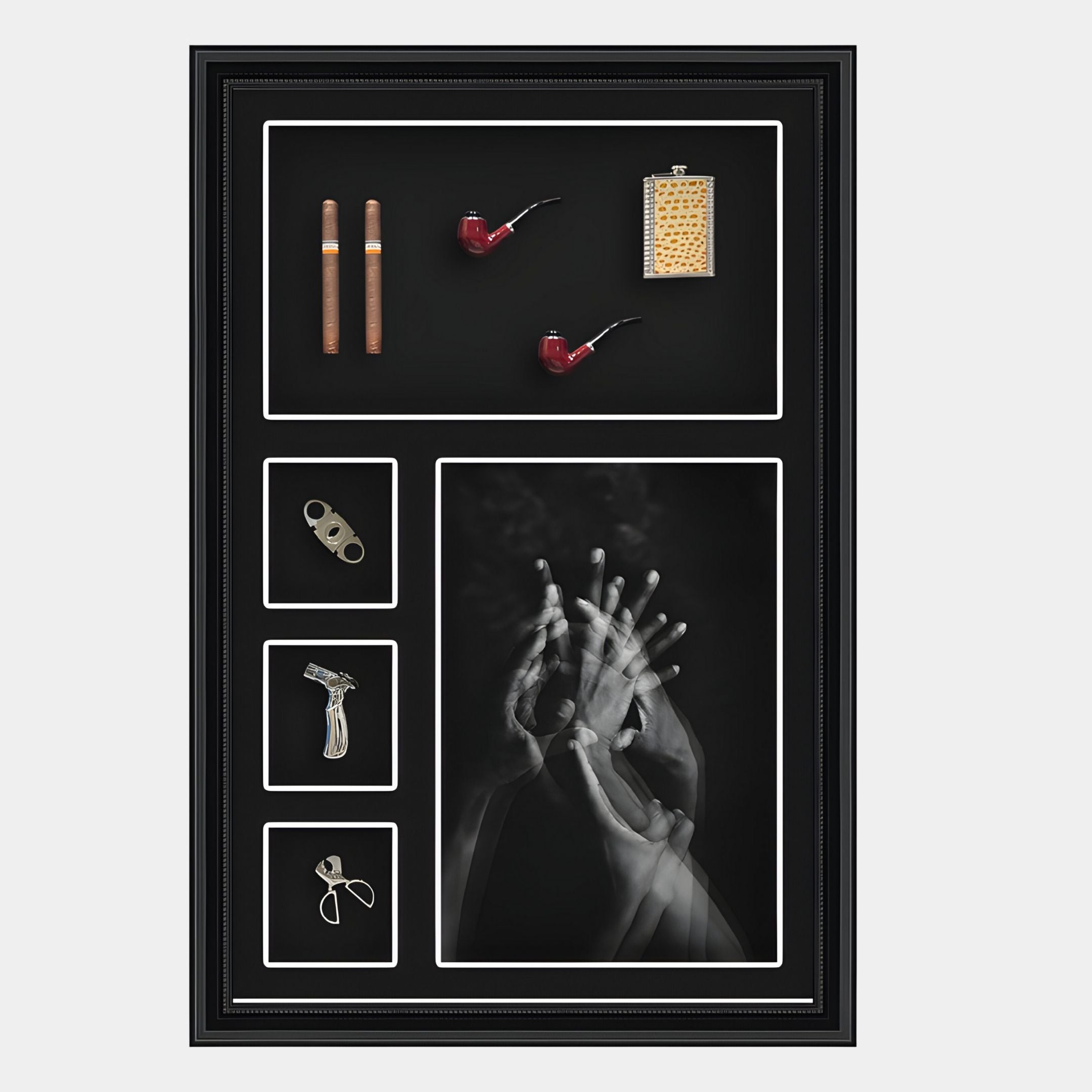The Curatoria Cigar & Hand Study Framed Wall Art by Giant Sculptures features cigars, two pipes, a flask, a cigar cutter, vintage razor, corkscrew, and a black-and-white hand photo—all on a striking black background.