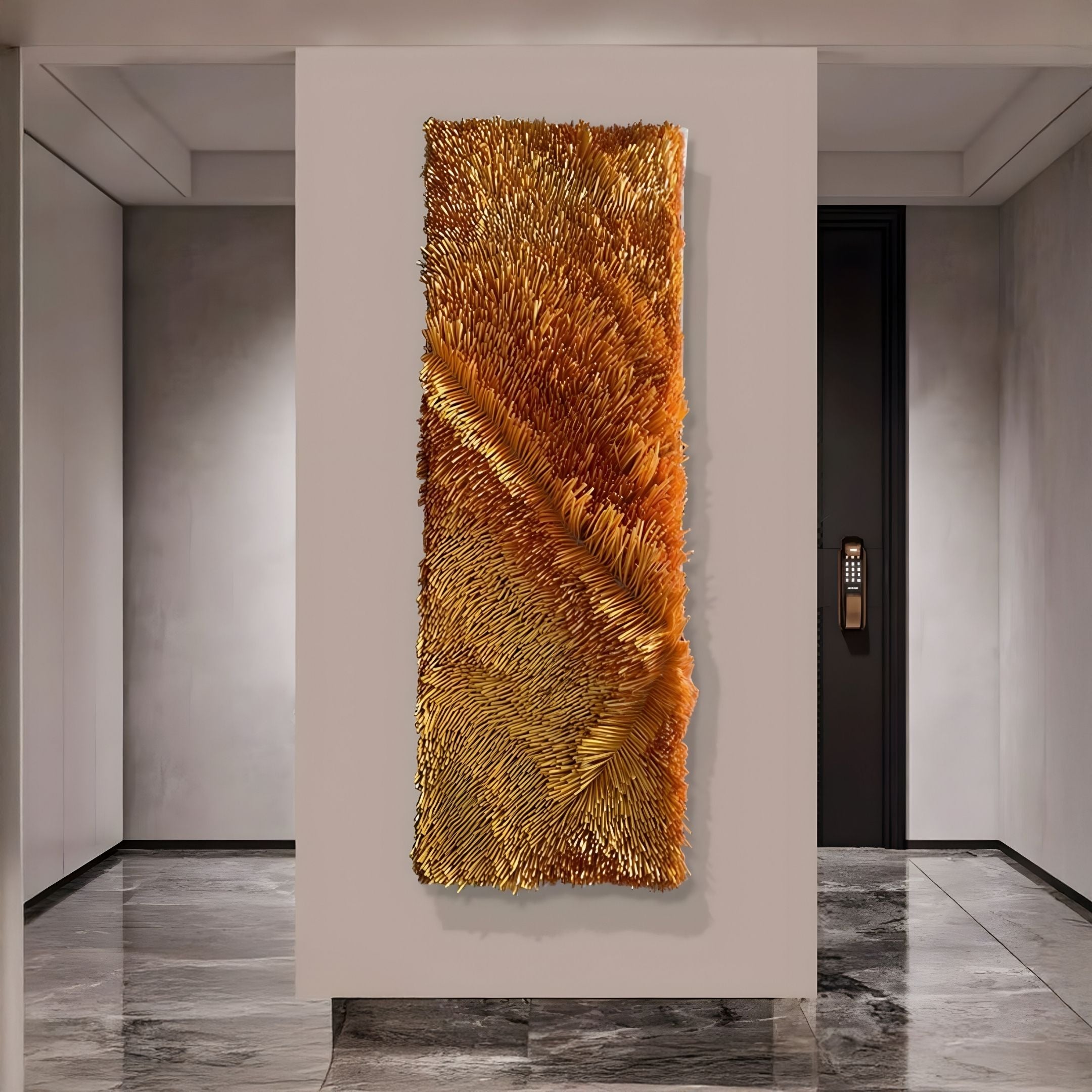The Bristella Ember Gold Textured Linear Panel 3D Wall Art by Giant Sculptures, with layered patterns, hangs on a white wall in a modern hallway with gray marble floors and minimalist decor.