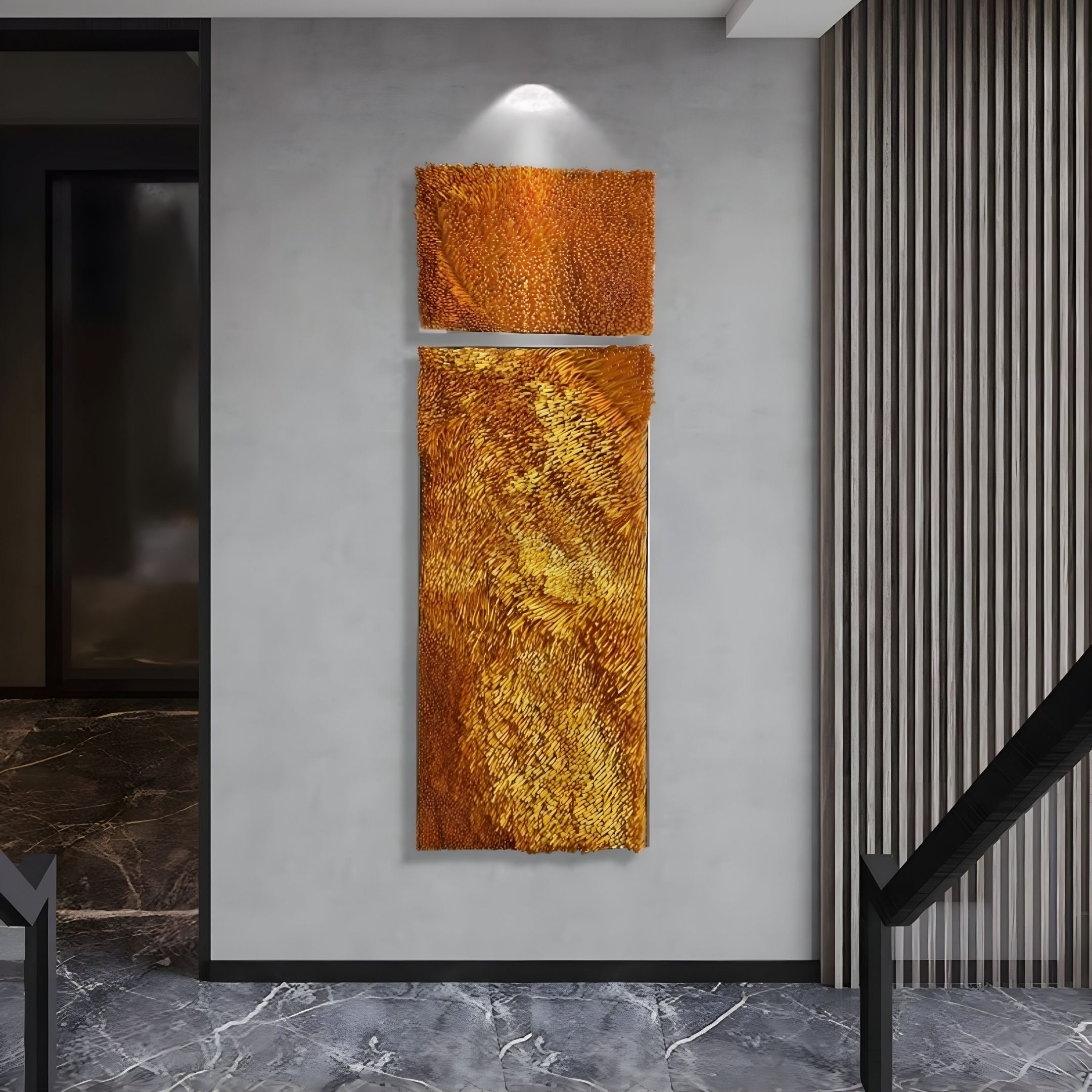 The Bristella Ember Gold Textured Large Panel 3D Wall Art by Giant Sculptures features two textured orange rectangles under a spotlight, mounted on a gray wall with marble floors and vertical wooden slats in modern interiors.