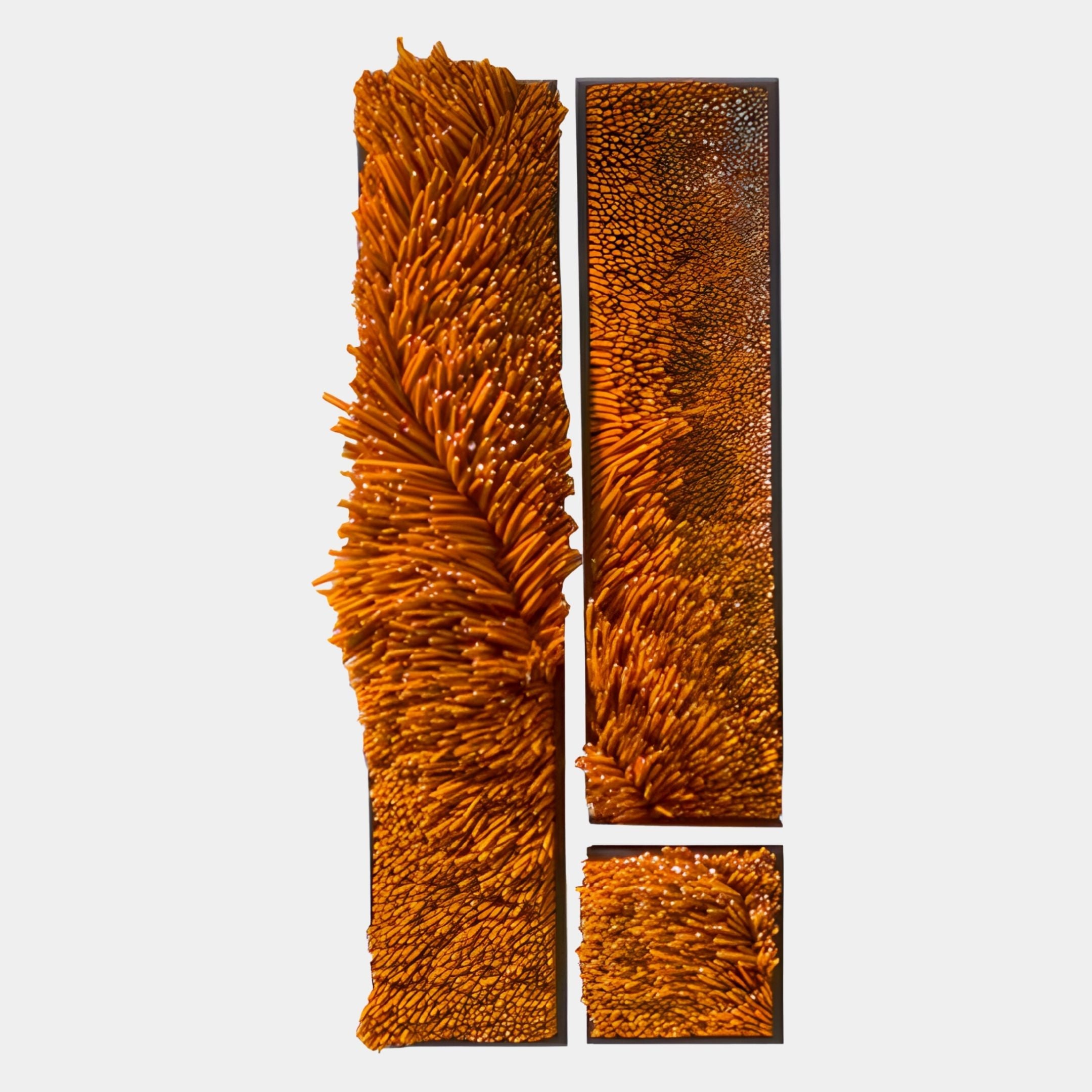 The Bristella Amber Textured 3-Panel 3D Wall Art by Giant Sculptures features vibrant orange, coral-like spikes on a gray background, creating a bold and dynamic centerpiece for any space.