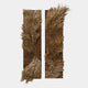 The Bristella Umber Brown Textured 2-Panel 3D Wall Art by Giant Sculptures features densely packed, uneven wooden sticks on two vertical panels, creating organic, wave-like textures and dynamic movement.