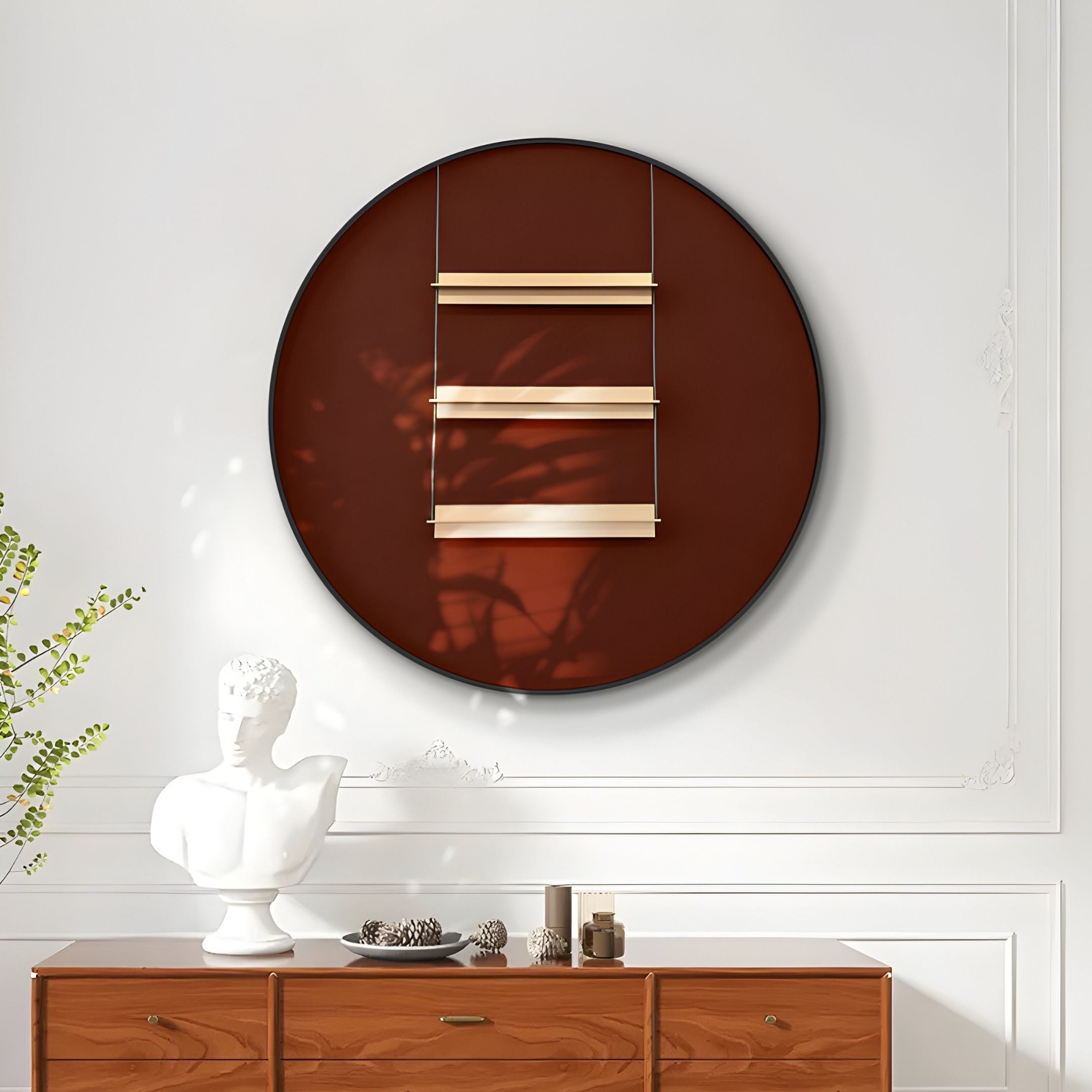 A modern interior featuring the Straylight Terracotta Red Tiered Bar Round 3D Wall Art by Giant Sculptures, a white bust, decorative wooden sideboard, leafy plant on the left, and elegant white wall panels for a minimalist touch.