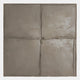 The Terracrecta Taupe Painted Textured Square 3D Wall Art by Giant Sculptures features hand-painted neutral taupe divided into four uneven sections with raised lines, forming a subtle grid and tactile surface ideal for modern spaces.