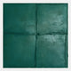 The Terracrecta Deep Green Painted Textured Square 3D Wall Art by Giant Sculptures features raised lines dividing the surface into four uneven sections, with a rough, painterly texture that lends a tactile, sculptural wabi-sabi feel.