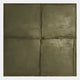 The Terracrecta Olive Painted Textured Square 3D Wall Art by Giant Sculptures features four raised sections in a textured olive finish, adding Wabi-Sabi charm with its rough surface and subtle shading to any decor.