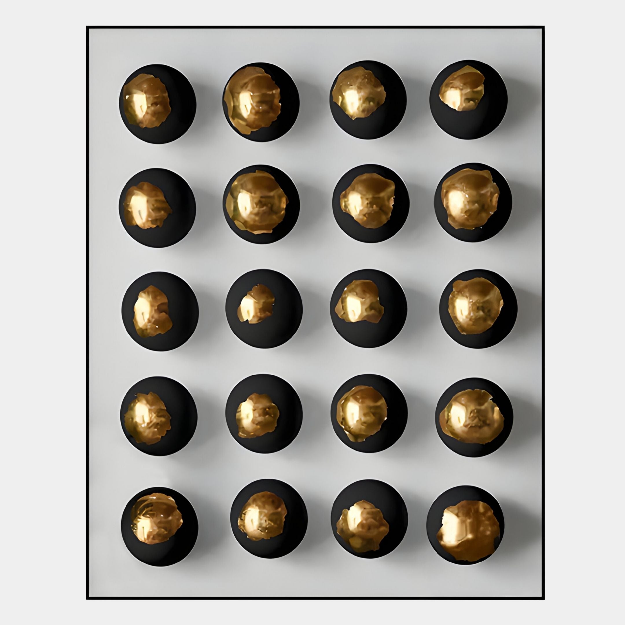 The Orbivelle Black-Gold Patch Sphere & White Panel 3D Wall Art by Giant Sculptures features 16 black spheres with shiny gold tops, evenly arranged on a white panel for a modern, geometric accent—ideal as striking wall decor.