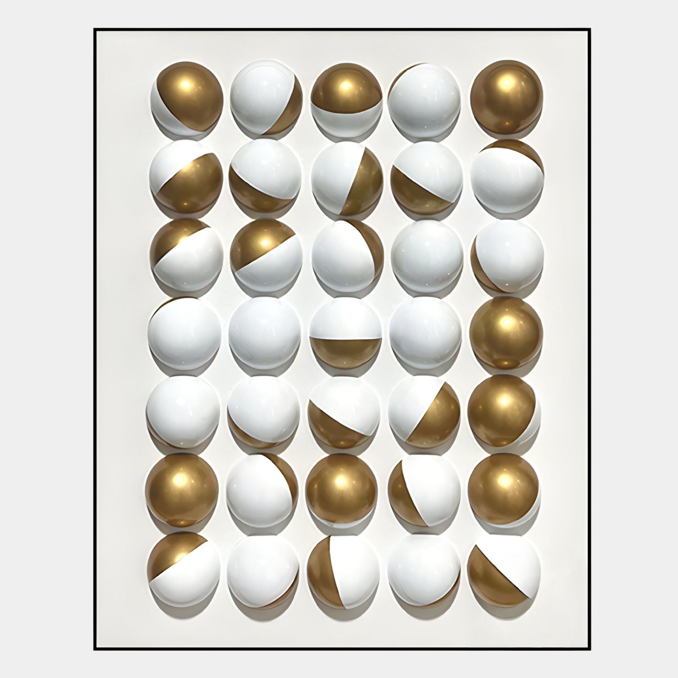 The Orbivelle Gold Split Sphere & White Panel 3D Wall Art by Giant Sculptures features 30 white, gold, or split gold spheres in a 5x6 grid on a white background with a thin black border.