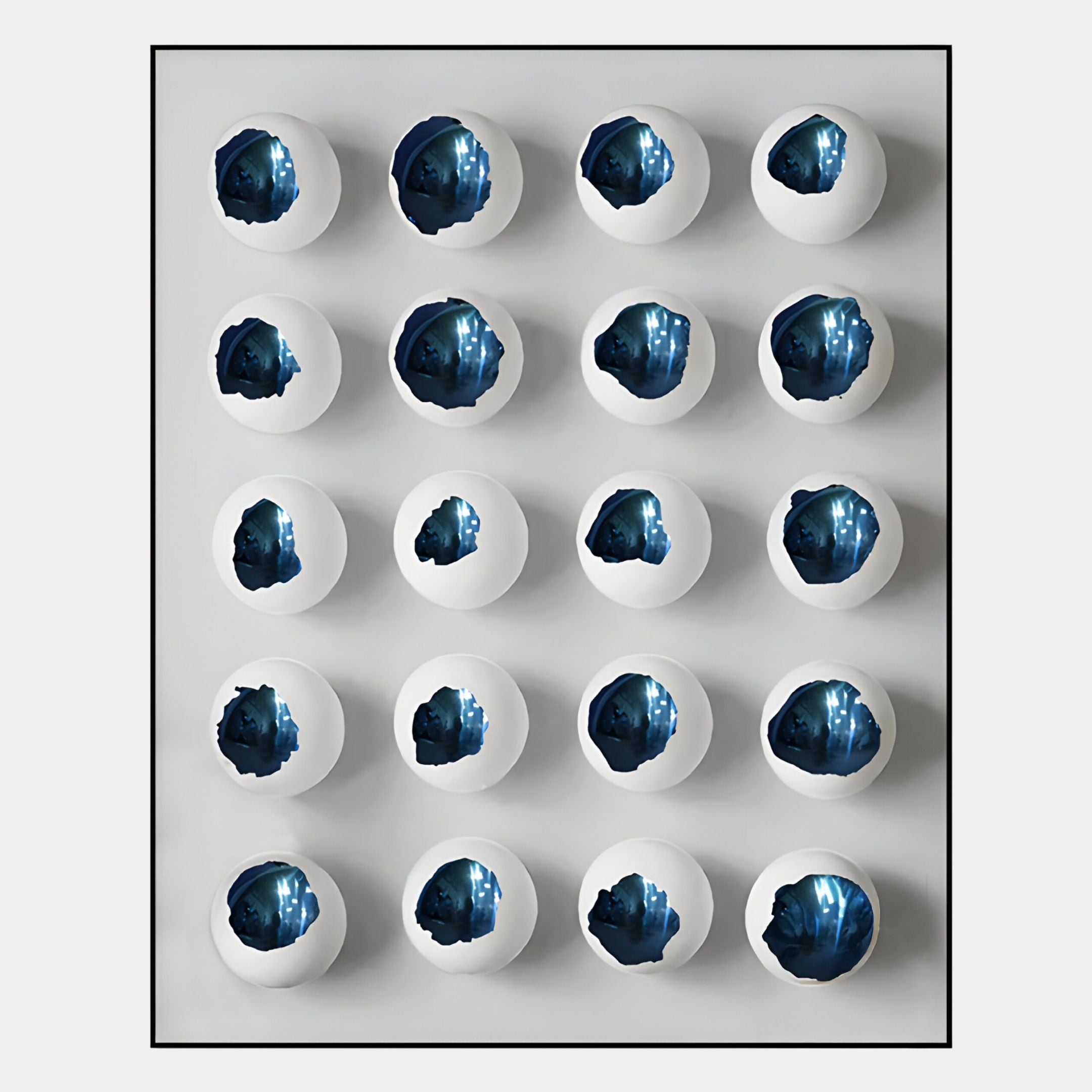 Orbivelle Cobalt Patch Sphere & White Panel 3D Wall Art by Giant Sculptures features 20 white eggshells, each with a vibrant blue crystalline interior, creating striking modern décor for any light-toned space.