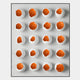 The Orbivelle Amber Patch Sphere & White Panel 3D Wall Art by Giant Sculptures features sixteen white eggshells with cracked tops and vivid orange yolks, creating bold, modern decor for any contemporary space.