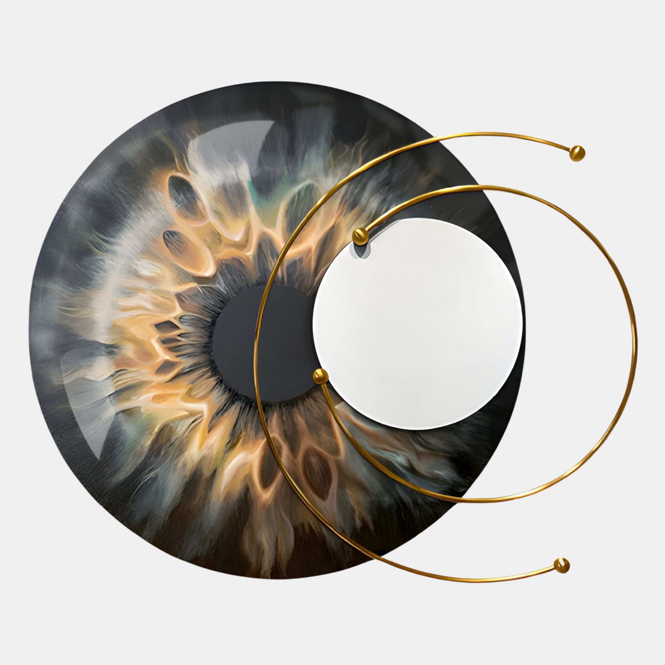 Aurelios Amber Flare Crystal Porcelain & Gold Orbit 3D Wall Art by Giant Sculptures features a circular eye-like design with swirling black, brown, and gold patterns, intersected by two gold arcs and a small round mirror.