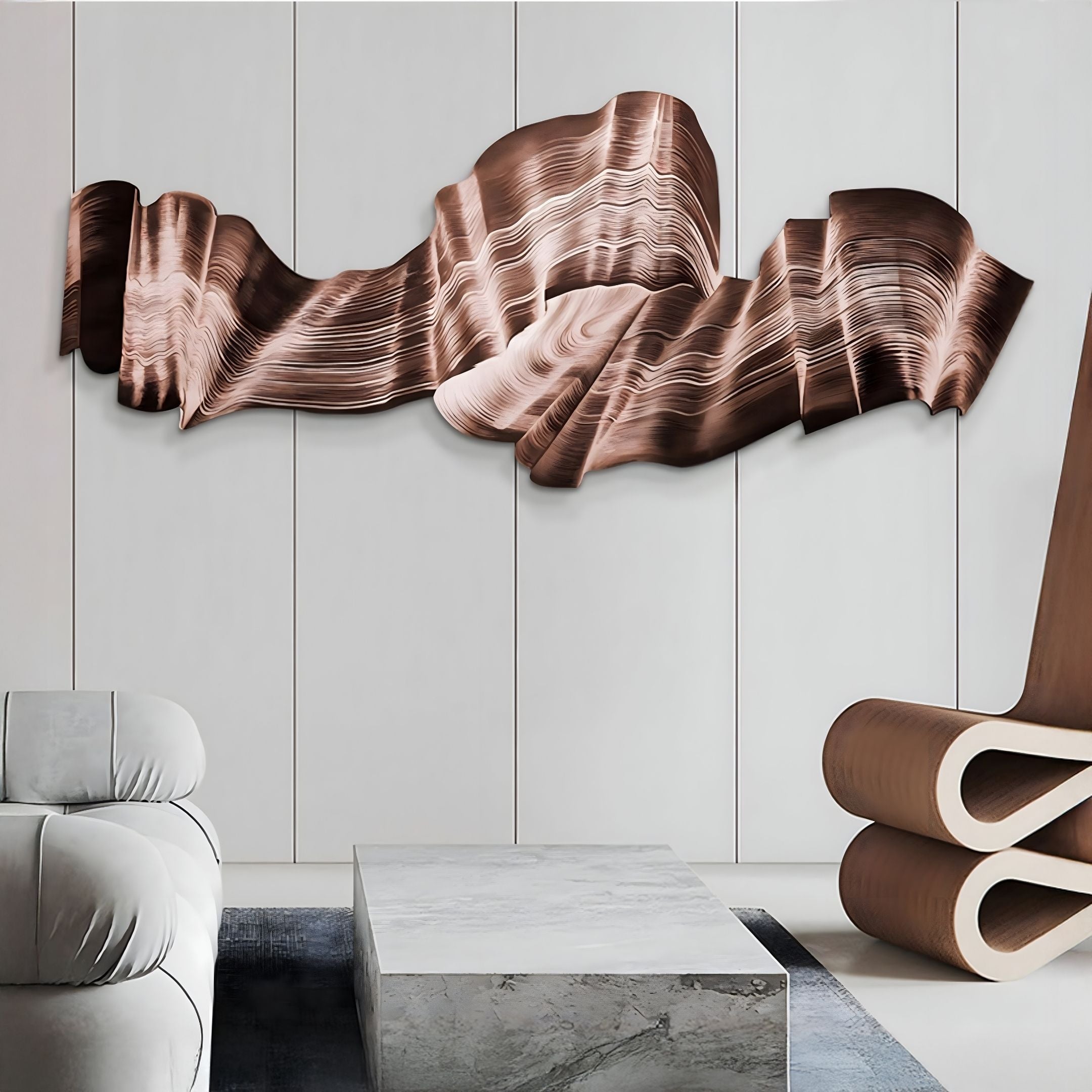 The Vellun Wave Bronze Drift Sculptural 3D Wall Art by Giant Sculptures creates a stunning focal point on a light gray wall, complemented by modern furniture and a marble coffee table.