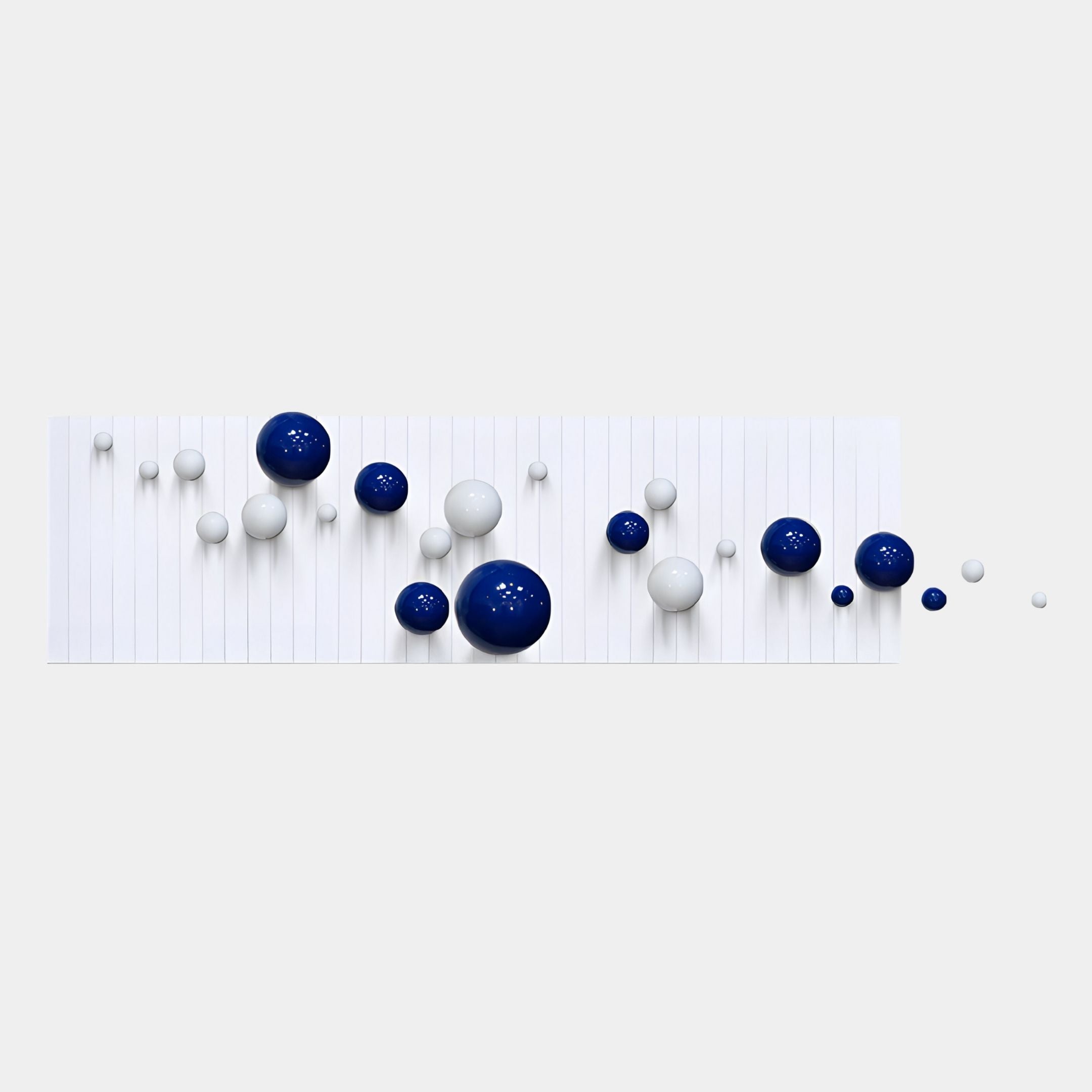 The Orbivance Blue & White Sphere Panel 3D Wall Art by Giant Sculptures features glossy blue and matte white spheres in an abstract, linear pattern on a rectangular, white-grooved background for a contemporary touch.