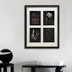 The Cavendrix I Gentleman Cigar Set Curated Framed Wall Art by Giant Sculptures, featuring four sections with pipes and accessories, hangs on a light gray wall above a modern black stool and a round table with a white cushion.