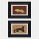 The Kansora Leopard Emblem 2-Set Framed Wall Art by Giant Sculptures features animal designs: a yellow abstract animal on red above a detailed leopard emblem on tan, both in black frames with cream mats.