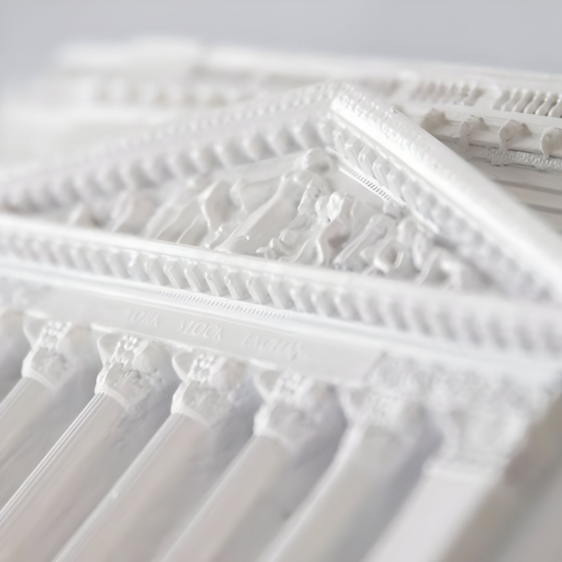 The Capitolique White Classical Facade 3D Wall Art by Giant Sculptures features a detailed neoclassical design with columns and a triangular pediment, inspired by the New York Stock Exchange—ideal as a striking sculptural wall installation.