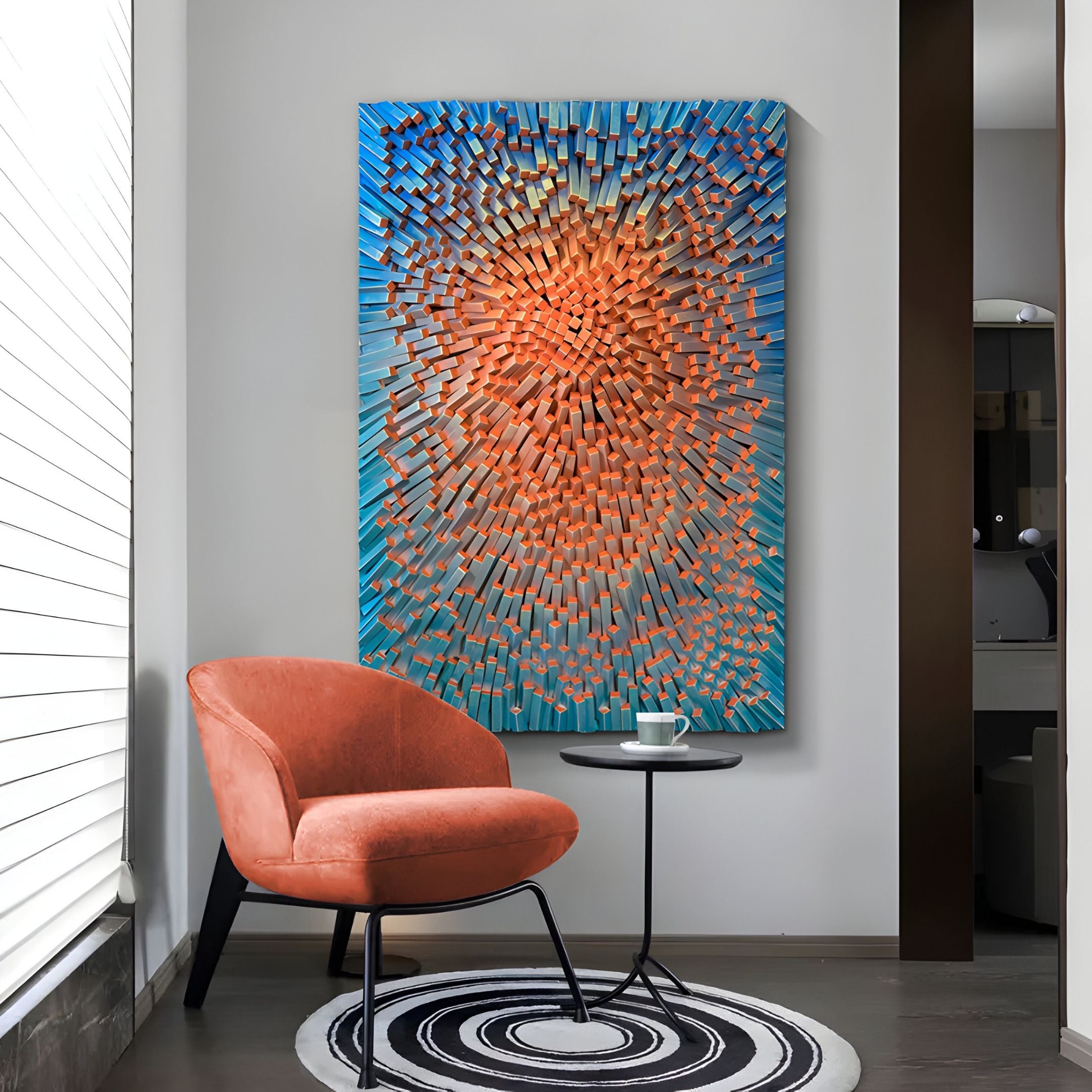 A modern room with an orange chair, small round table with a cup and saucer, circular black and white rug, and the Heliox Azure Radiance Sculptural 3D Wall Art by Giant Sculptures featuring bold orange and blue geometric shapes.