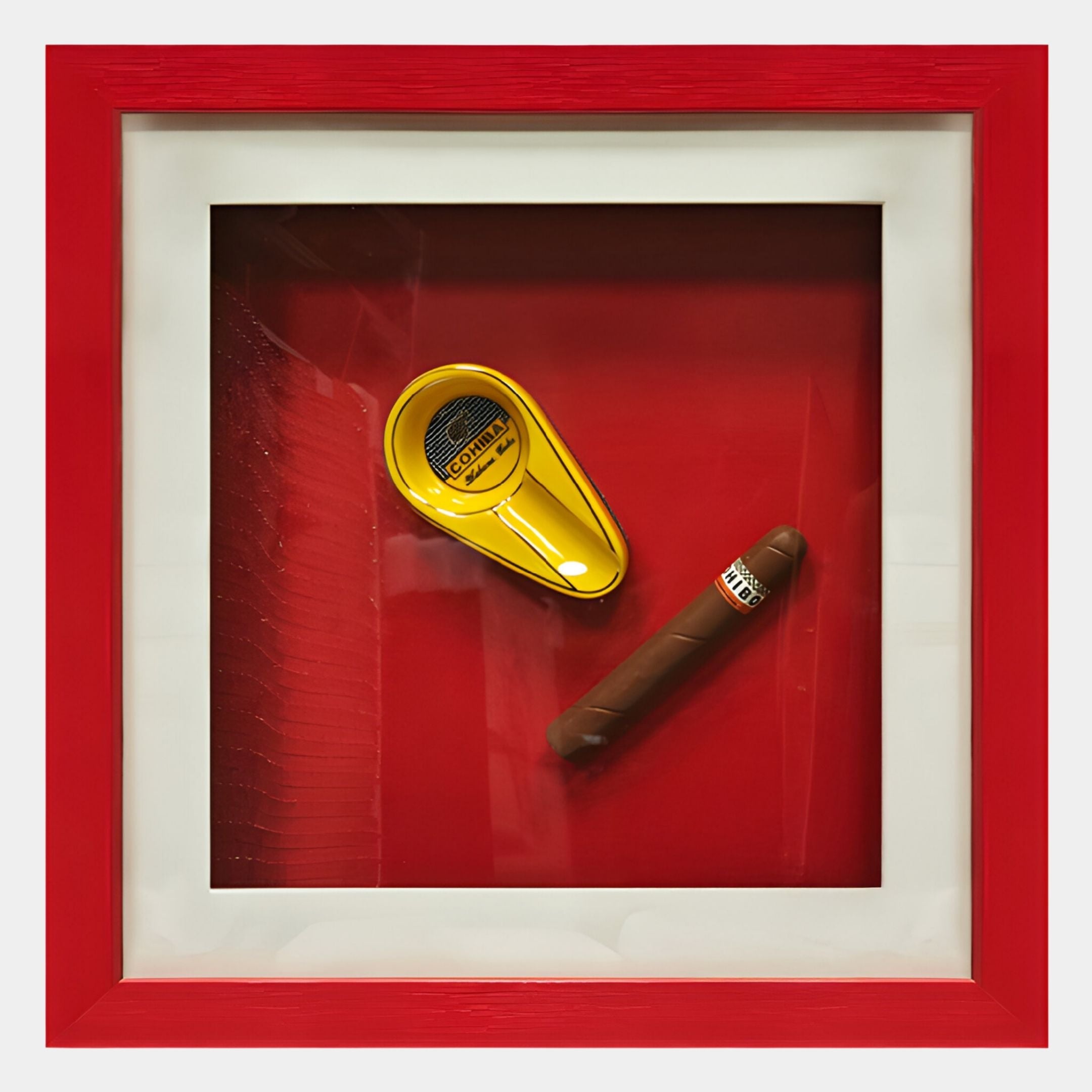 The Cavendro Gold Ashtray & Cigar Framed Wall Art by Giant Sculptures features a yellow cutter and brown Cohiba-labeled cigar in a white and red shadow box, offering bold modern décor for cigar lovers.