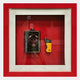 The Cavendro Flask & Butane Lighter Framed Wall Art by Giant Sculptures features both items mounted on a vivid red background in a bold red and white frame—a striking piece of contemporary décor.
