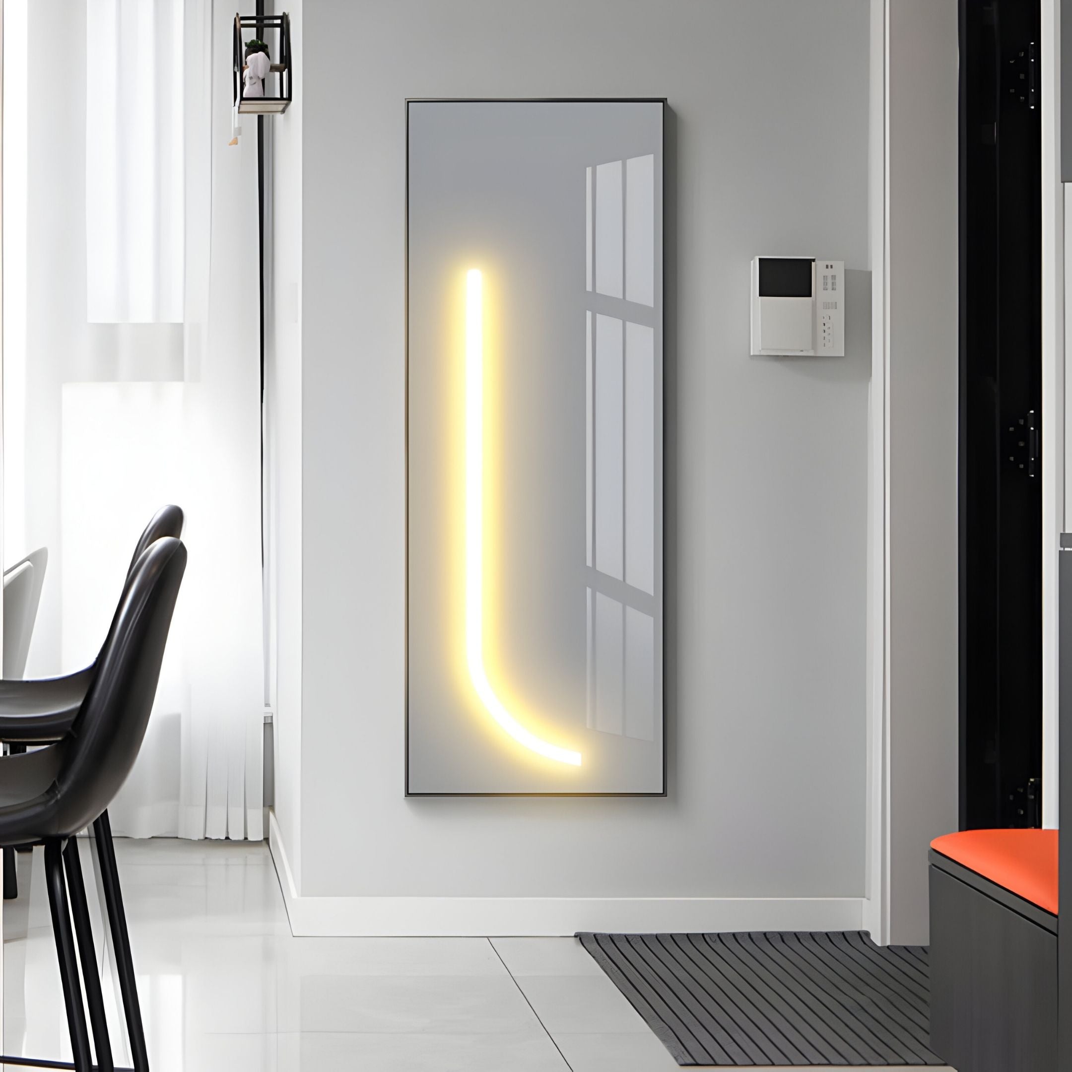 A modern hallway showcases the Luminarch Soft White Line LED Minimalist Wall Art by Giant Sculptures, wall-mounted in an illuminated L shape. A security keypad and sleek black and white furniture complete the space, with light streaming through sheer curtains.