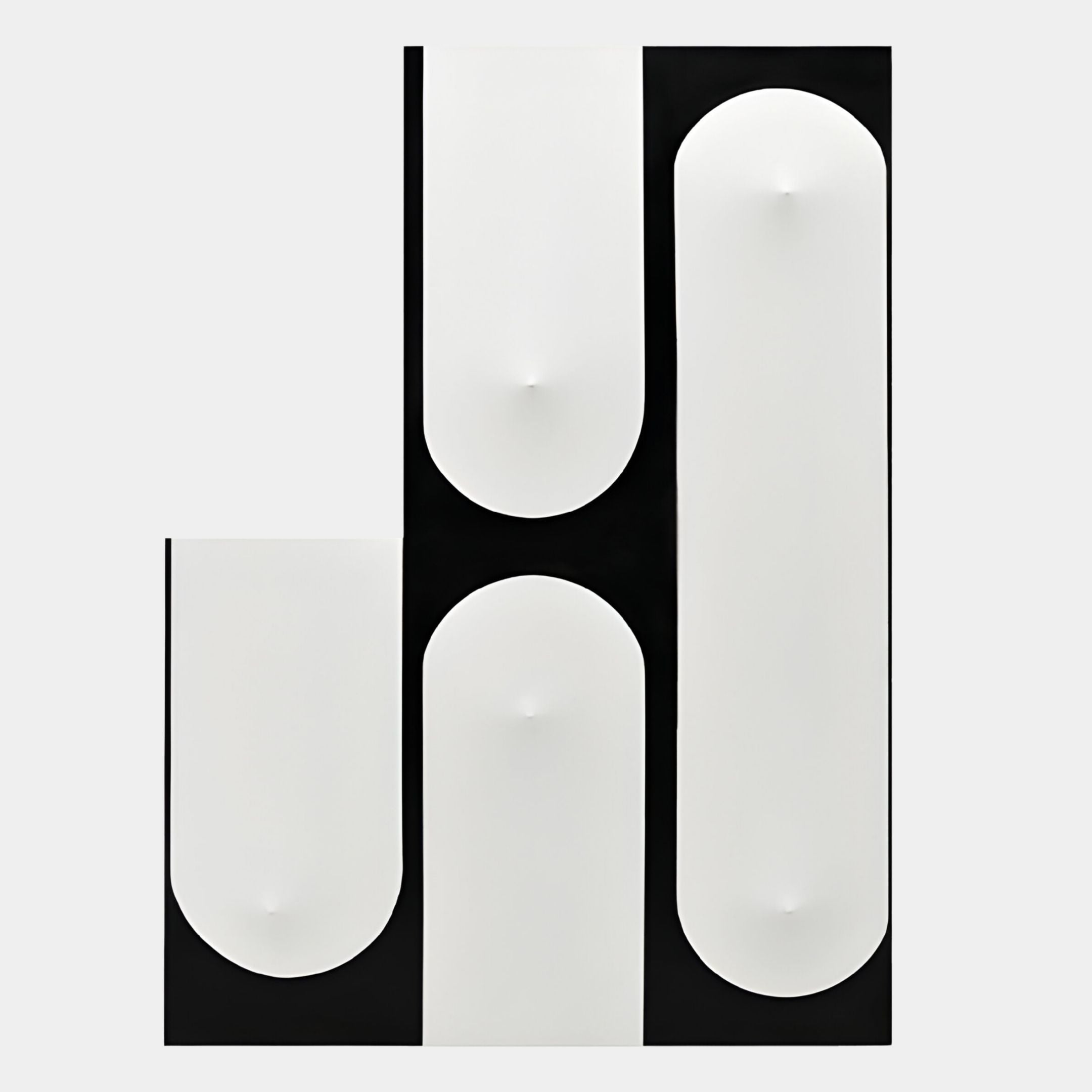 The Curventa Black & White Curved Panel 3D Wall Art by Giant Sculptures features abstract black and white geometric forms—vertical and horizontal rectangles with rounded ends and subtle center curves—set against a neutral background.