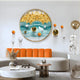 A modern living room featuring a curved orange-and-white sofa, round tables, abstract animal figurines, and the Aureluxe Teal & Gold Drift 3D Wall Art With Metal Balls by Giant Sculptures on the wall with striking blue, gold, and white elements.