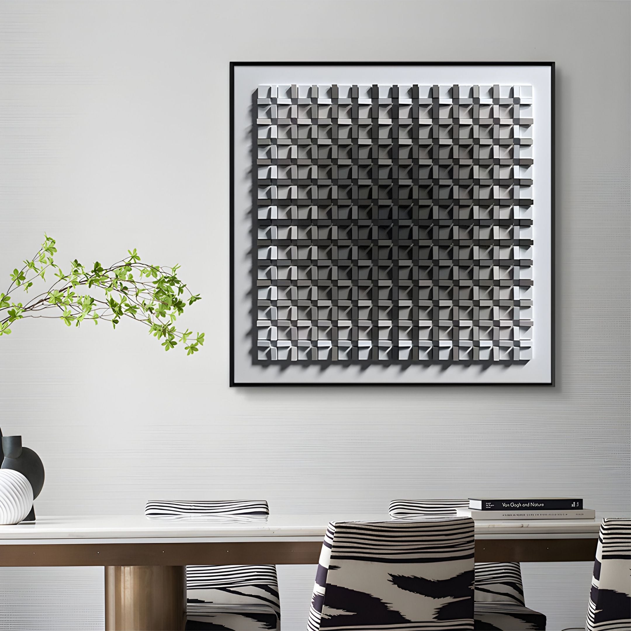 A modern dining room features zebra-patterned chairs, a striped vase with a leafy branch on the table, and Giant Sculptures’ Gradisect Deep Grey Fade Geometric 3D Wooden Wall Art, showcasing chic contemporary style.