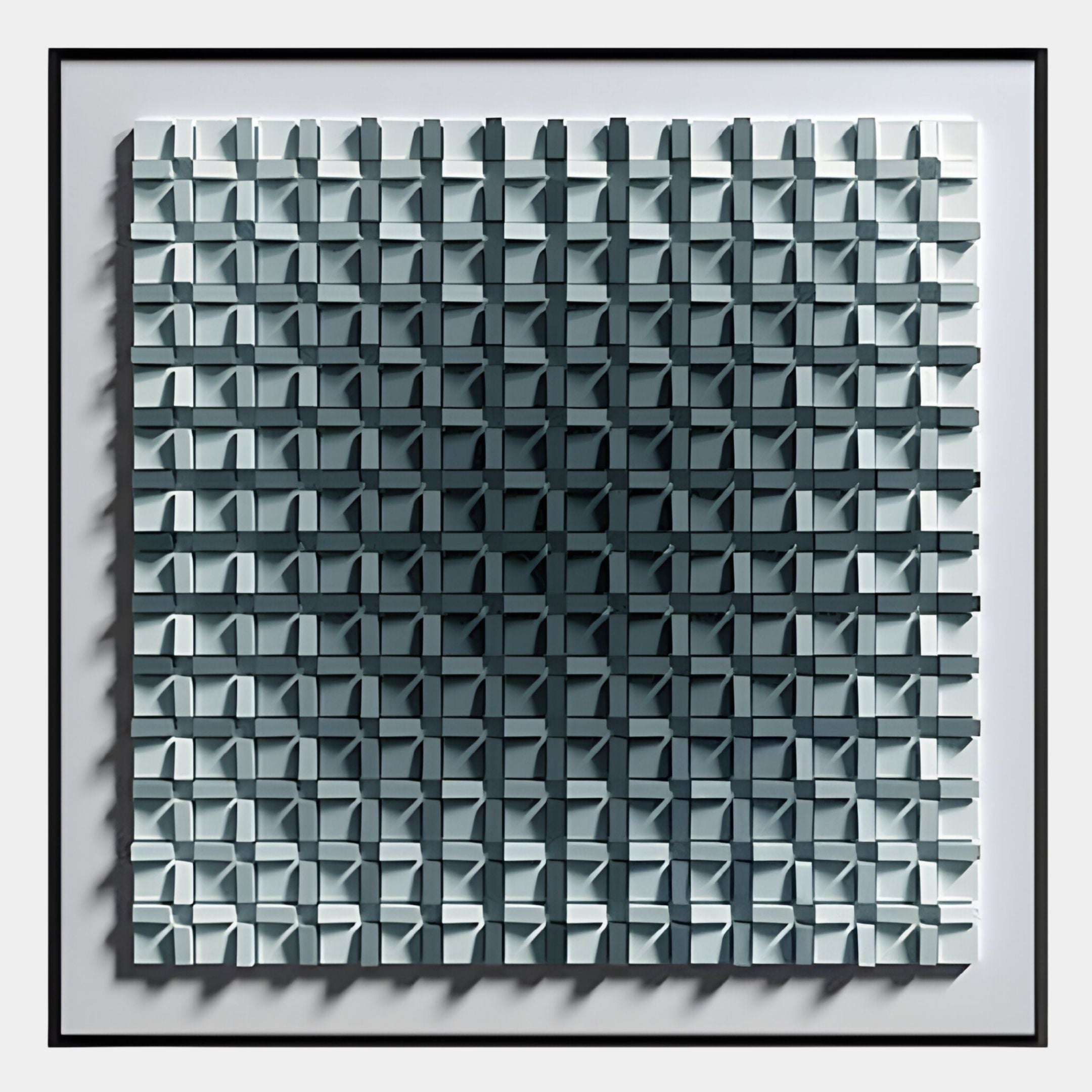 The Gradisect Slate Teal Fade Geometric 3D Wooden Wall Art by Giant Sculptures features three-dimensional rectangular shapes in a modern grid, with colors fading from light gray to dark gray for a bold gradient and shadow effect.