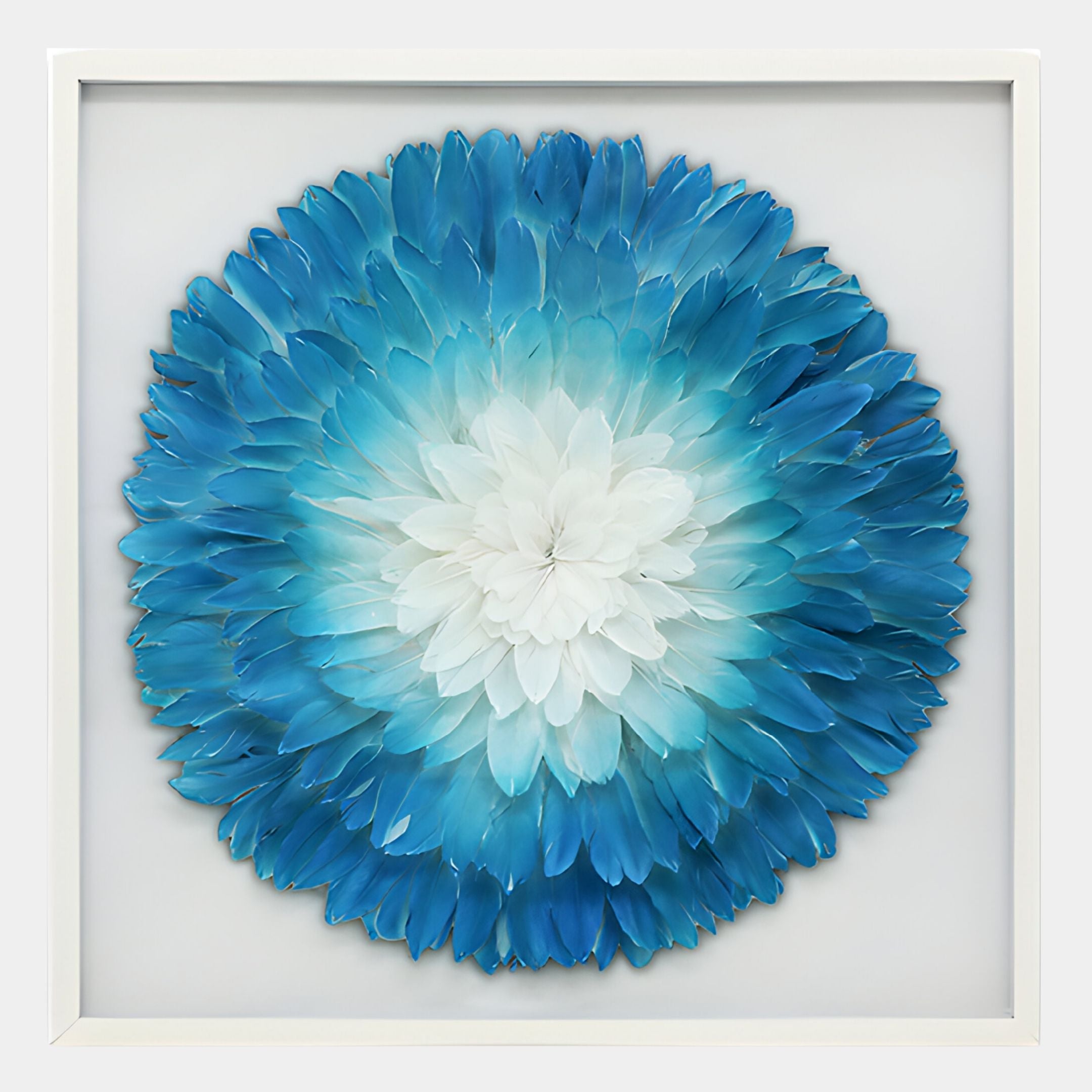 The Plumesse Aqua Bloom Layered Feather 3D Wall Art by Giant Sculptures features a large, framed flower with petals in shades from white to deep blue, arranged in a circular, radiating design.