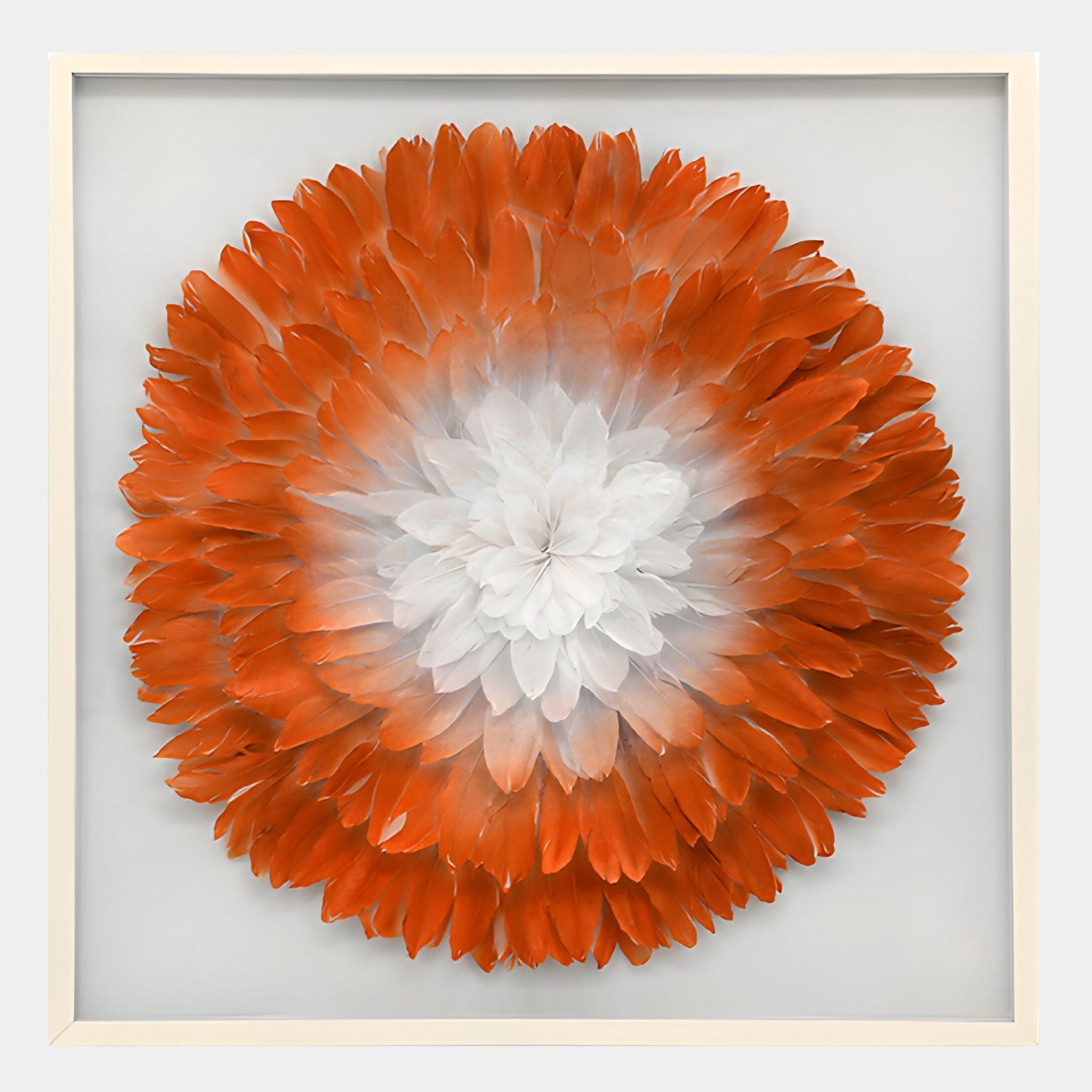 The Plumesse Amber Bloom Layered Feather 3D Wall Art by Giant Sculptures displays white feathers at the center fading into orange, creating an amber bloom effect for a vibrant, floral look on a light background.