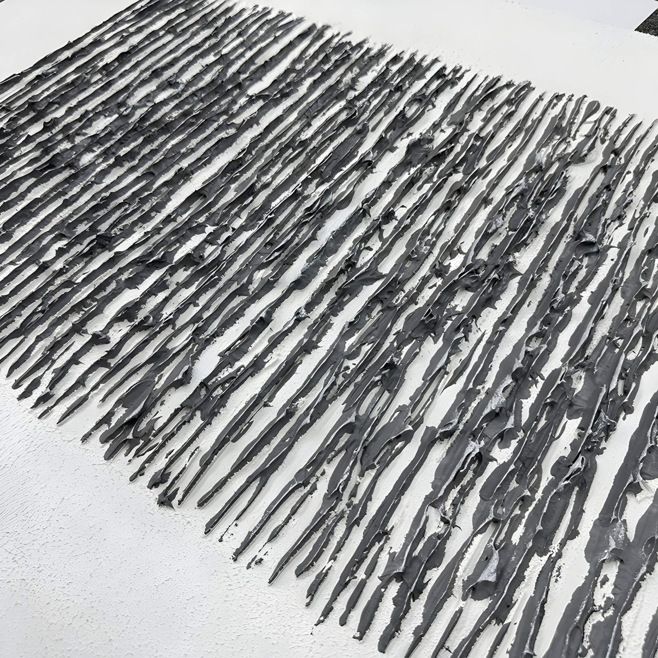 The Stratonis Grey Linework Textured Framed Wall Art by Giant Sculptures features textured grey paint applied in uneven vertical lines on white, creating a tactile, abstract pattern—ideal as minimalist wall decor or statement art.