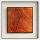 Stratonis Ember Linear Textured Framed Wall Art by Giant Sculptures features an orange background with raised wavy metallic lines and scattered gold and silver specks, adding a modern, flowing touch to your contemporary space.