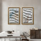 A modern dining room with a minimalist table, four chairs, and two Giant Sculptures Linscario Mistfold White & Blue Ripple Texture 3D Wall Art pieces framed and hung side by side—ideal for luxury interiors.
