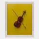 The Archetto Yellow Violin Acrylic Framed 3D Wall Art by Giant Sculptures features a violin and bow in an X shape on a vivid yellow background, encased in a clear rectangular frame—a bold, modern decor piece.