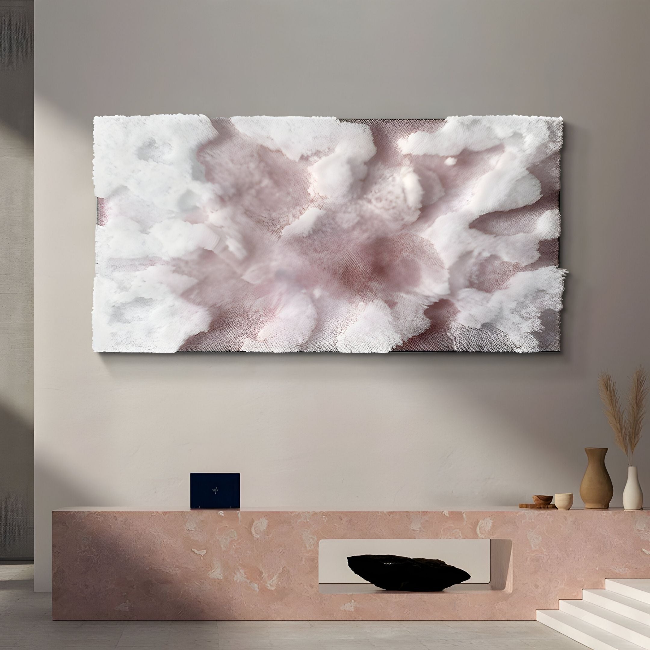 A modern minimalist living room in neutral tones showcases the Giant Sculptures Nivara Rose Mist Ripple Straw 3D Wall Art in soft pink and white above a pink stone mantle, with decorative vases and a black sculpture for a stylish finish.