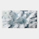 The Nivara Ice Blue Ripple Straw 3D Wall Art by Giant Sculptures features soft, cloud-like white forms on an ice blue and gray background, perfect for contemporary interiors.