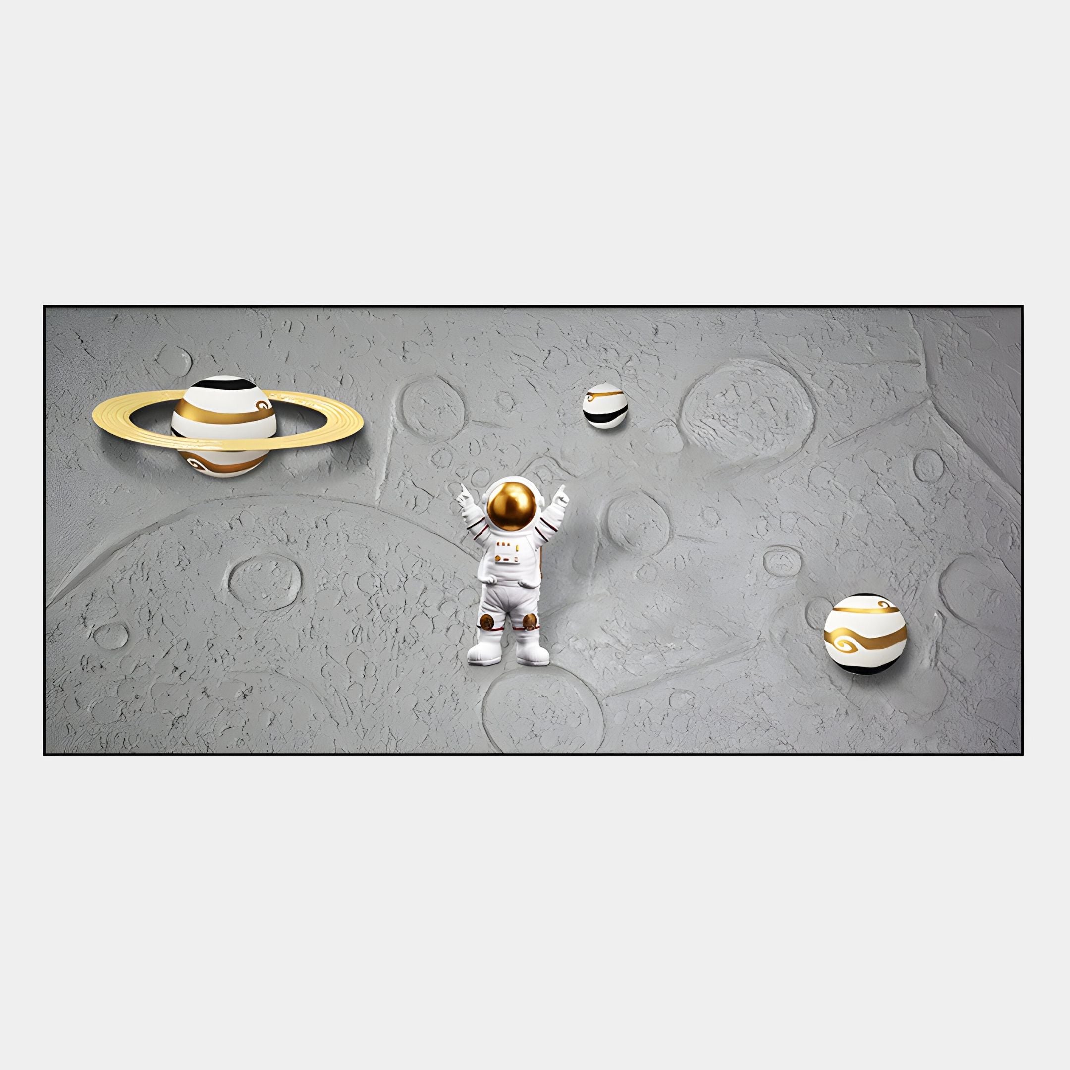 The Astravera Saturn Loop Gold Ring Planet Astronaut 3D Wall Art by Giant Sculptures features an astronaut with a gold visor on a cratered surface, arms raised, surrounded by gold and white planets—ideal for cosmic décor lovers.