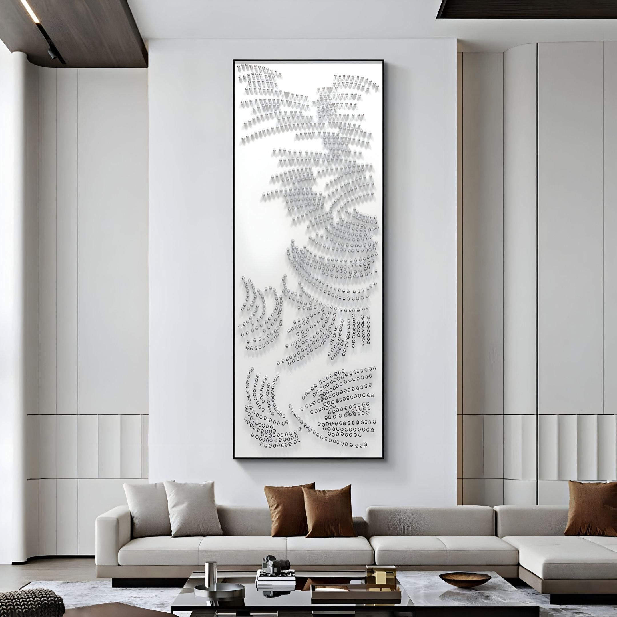 A modern living room featuring the Auravolta V Pearl Beads Swirl Pattern 3D Wall Art by Giant Sculptures on tall white minimalist paneled walls, plus a light gray sectional sofa with brown and beige pillows and low tables.