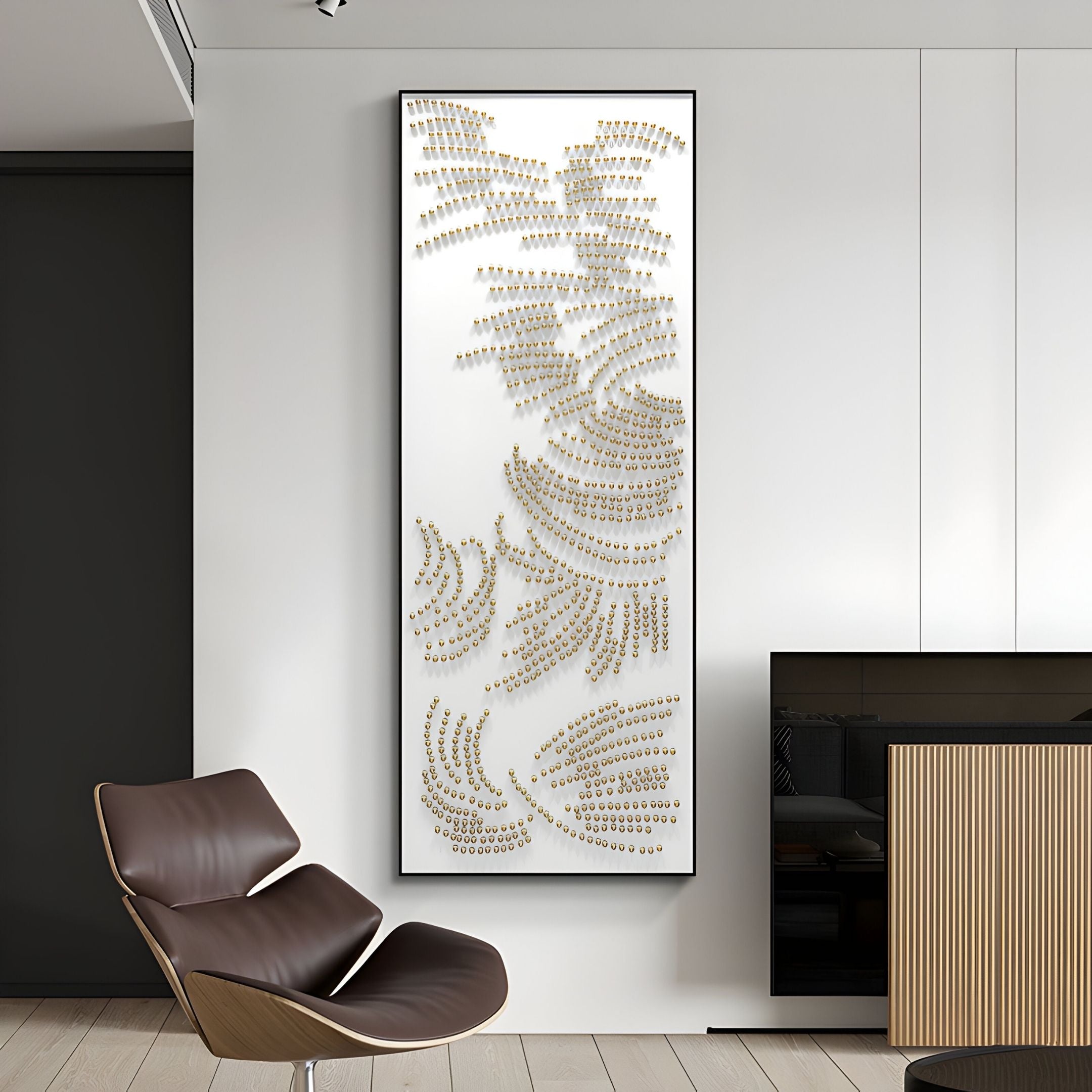 A modern living space with a sleek brown chair and Giant Sculptures' Auravolta V Pearl Beads Swirl Pattern 3D Wall Art—an abstract piece with gold circular elements on white, framed in black.