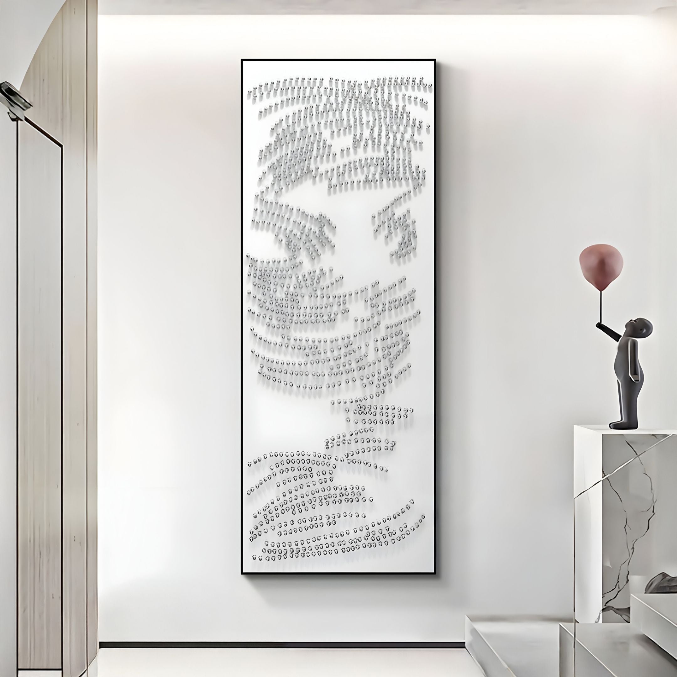 The bright, minimal space features the Auravolta VI Pearl Beads Swirl Pattern 3D Wall Art by Giant Sculptures on a white wall and a modern sculpture of a figure with a pink balloon on white marble steps.