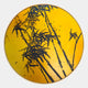 The Auralune Golden Bamboo Silhouette Round 3D Wall Art by Giant Sculptures features bold bamboo silhouettes on a bright yellow background, making it a striking modern decor piece that adds a touch of nature-inspired style to your space.